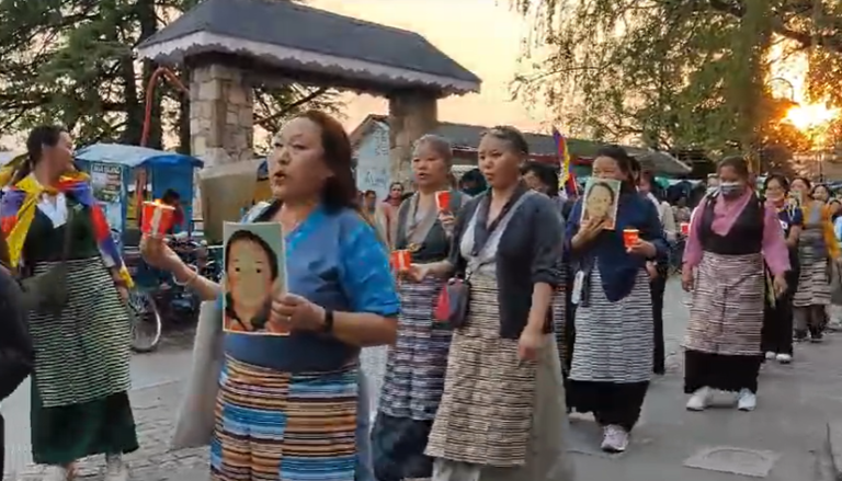 tibetan community took out candle march in mussoorie demanding release of 11th panchen lama