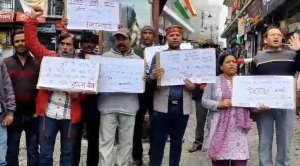 dehradun teenager gangrape case | protest against dhami government |